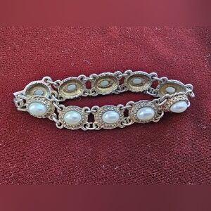 Elegant Gold and Silver Bracelet with Pearls